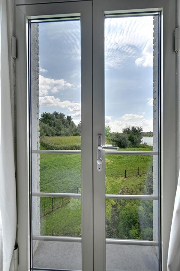 B&B Pompgebouw Aan De Rijn Tolkamer Luaran gambar